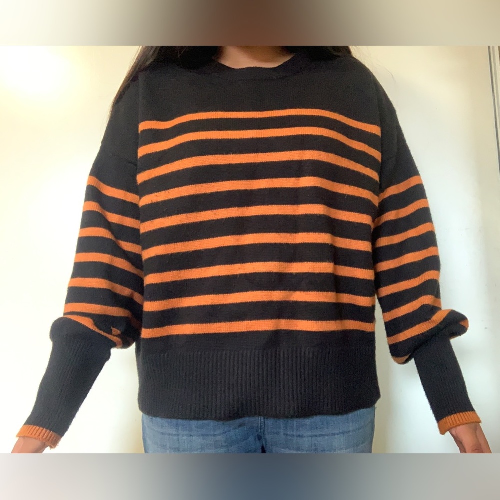 black and orange knit sweater